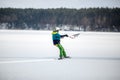 Men ski kiting on a frozen lake Royalty Free Stock Photo