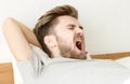 Men are Sleepy after wake up in the morning. Royalty Free Stock Photo