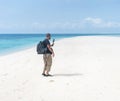 Men with smartphone camera filming beautiful tropical beach