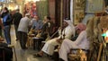 Men smoking Sheesha or water pipes in cafe at Souq Waqif, Doha
