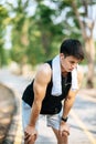 Men stand and bow and rest after exercising on the roadside Royalty Free Stock Photo