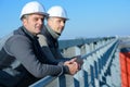 men standing at natural gas facility Royalty Free Stock Photo