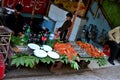 Men at street side restaurant with marinated meat on display Murree Pakistan