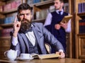 Men in suit, detectives spend leisure in library. Royalty Free Stock Photo