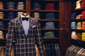Men suit shop clothing store, dark background Royalty Free Stock Photo