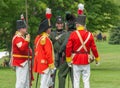 Men Talking before Battle Reenactment