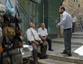 Men Talking in Jerusalem Street Royalty Free Stock Photo