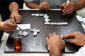 Men in teahouses drink tea and play dominoes Royalty Free Stock Photo