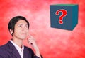 Looking over question mark box Royalty Free Stock Photo