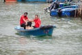 Men travelling with a boat at dragon boat festival in Taio O, Hong Kong Royalty Free Stock Photo