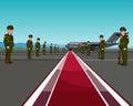Men in uniform standing on opposite sides of the red carpet about aircraft Royalty Free Stock Photo