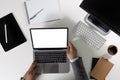 men using laptop computer with blank display white desktop screen monitor frame empty mockup for copy Royalty Free Stock Photo