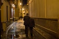 Men Walking in Seville at Night, Spain