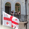 Men watch military parade. Tbilisi, Georgia. Royalty Free Stock Photo