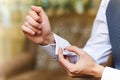 Men wear cufflinks Royalty Free Stock Photo