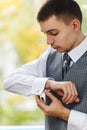 Men wear cufflinks Royalty Free Stock Photo