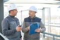 men wearing hardhat at natural gas processing facility Royalty Free Stock Photo
