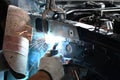 Men welder automotive part - auto body repair