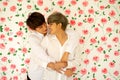 Men were happy together over rose background .  LGBT gay couple love concept Royalty Free Stock Photo