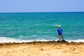 Fishmen is fishing on the sea in Greek beach Royalty Free Stock Photo