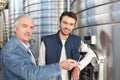 Men in a winemaking facility