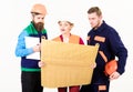 Men and woman in hard hats, architects on busy faces Royalty Free Stock Photo