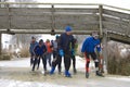 Men and woman skating on natural ice, Netherlands