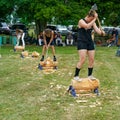 Men and women in a axe wood chopping competition, Motueka A and P show