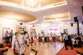 Men and women dancers performing Romanian folk dances