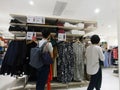 Shenzhen, China: shoppers shop for clothes at uniqlo`s clothing store at night Royalty Free Stock Photo