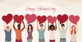 Group of men and women of different culture standing with arms raised holding a red heart.Valentine`s Day party concept.Copy space Royalty Free Stock Photo