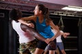 Men and women training self-protection moves in gym Royalty Free Stock Photo