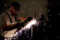 Men at work grinding steel Royalty Free Stock Photo