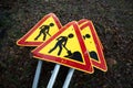 men at work signs on ground Royalty Free Stock Photo