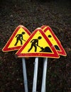 men at work signs on ground Royalty Free Stock Photo