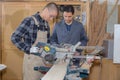 Men working in carpentry workshop Royalty Free Stock Photo