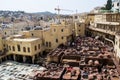 Chouara Tannery in Morocco, with round stone vessels for dyeing and softening leather in Fez el Bali Royalty Free Stock Photo