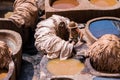 Chouara Tannery in Morocco, with round stone vessels for dyeing and softening leather in Fez el Bali Royalty Free Stock Photo