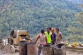 Men working at the construction road in inhuman conditions