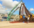 men working with fish nets