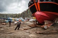 Men working on launching ship