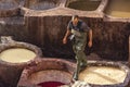 Men working in the leather tanneries in Fes, Morocco. Royalty Free Stock Photo