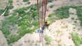 men working in meteorological tower next to stotm Royalty Free Stock Photo