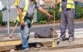 Men are working at the road construction