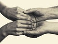 Men's hands hold the female palms
