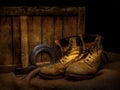 Men's old leather work boots with objects. Still life. Royalty Free Stock Photo