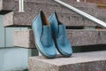 men's shoes moccasins blue color. photo on the street