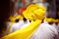 Men in yellow head wearable FETA in parade