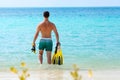 Men in yellow mask and flippers going snorkeling Royalty Free Stock Photo