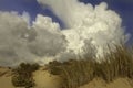 Menacing clouds over the pure sandunes at Sampieri beach in Sicily in a summer windy day Royalty Free Stock Photo